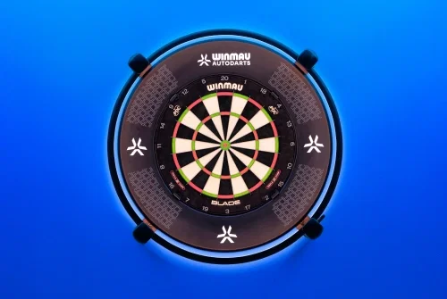 The Autodarts X camera and lighting ring mounted around a dartboard