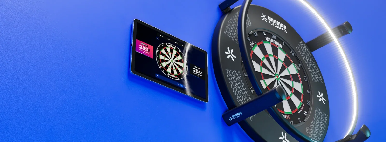 The Autodarts X lighting ring seen face on, lit, around a dartboard